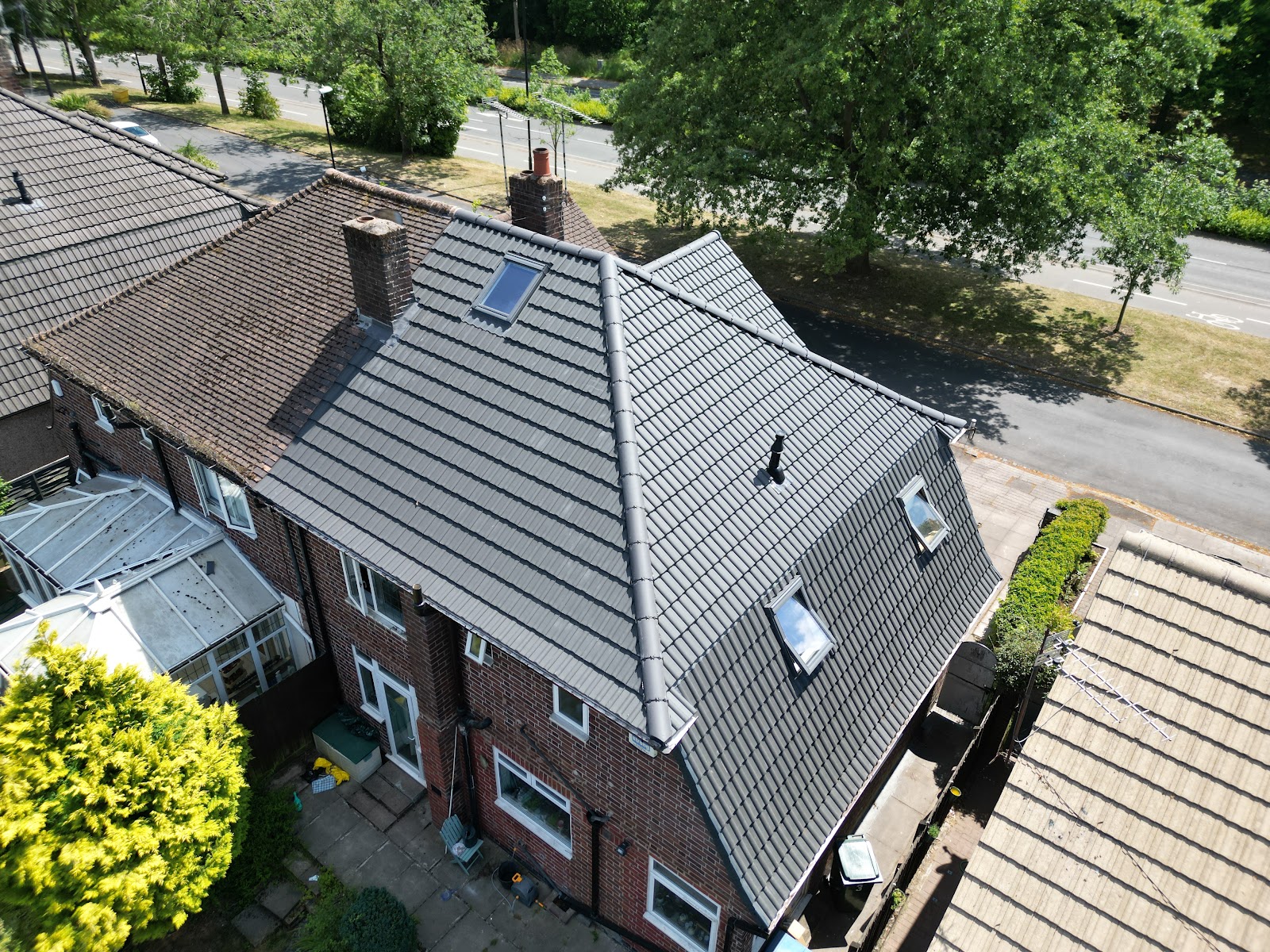 A newly tiled pitched roof completed by Morgan Roofing in Coventry