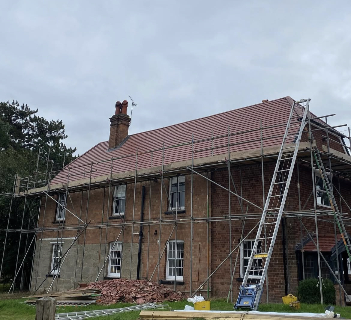 Full tile re-roof with scaffolding by Morgan Roofing