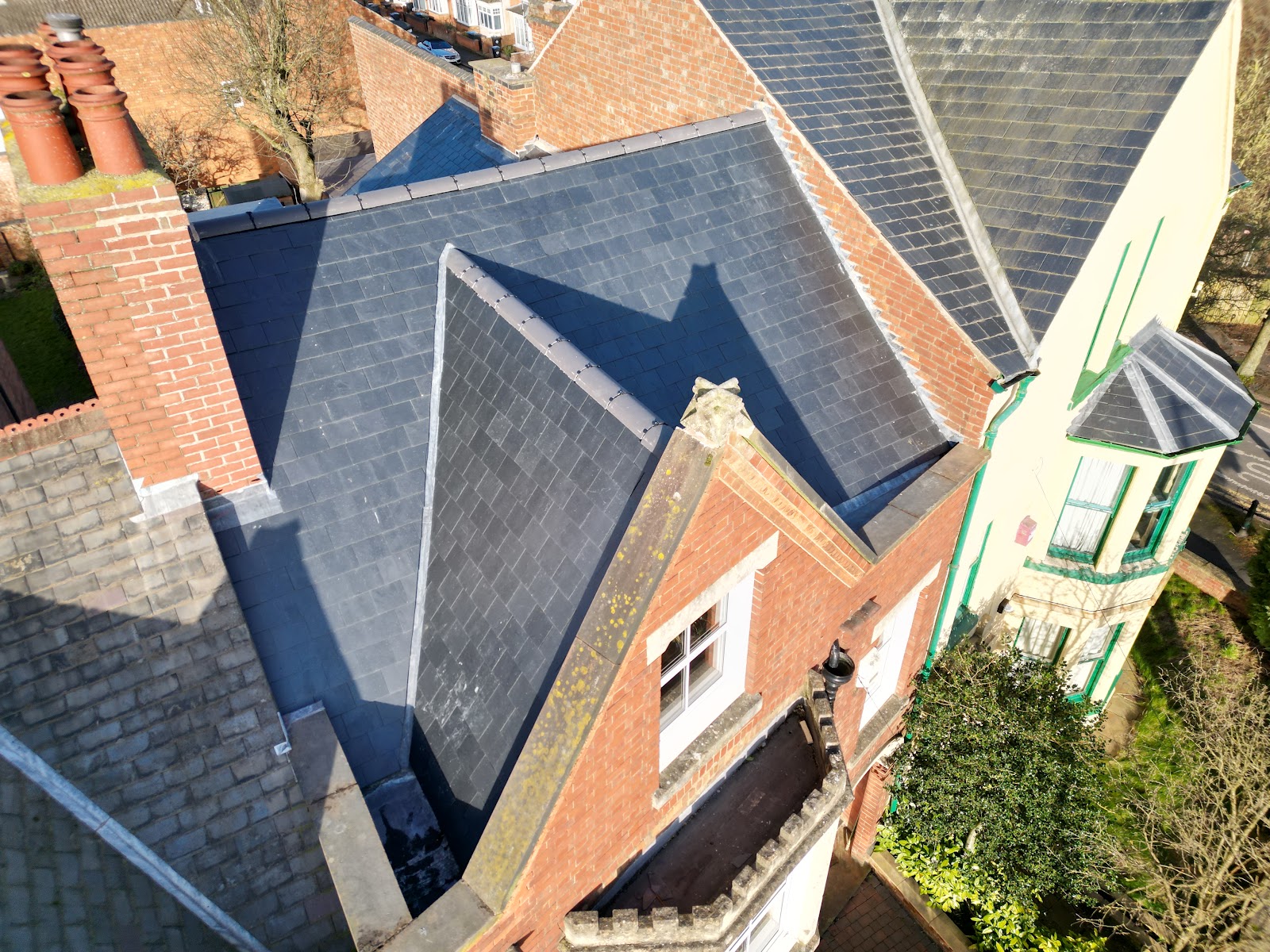 A completed natural slate roof on a Coventry house, fitted by Morgan Roofing
